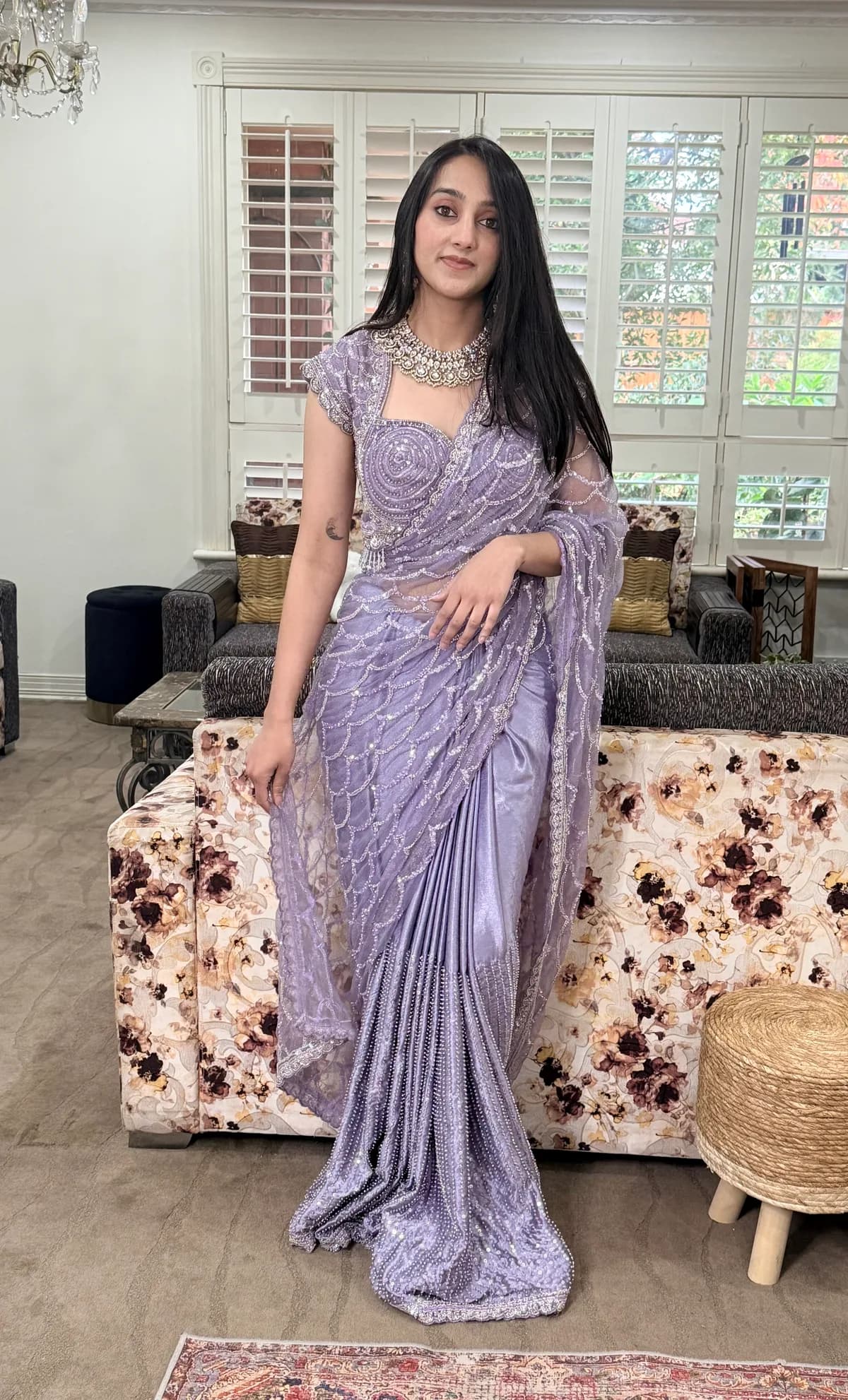 Lavender embroidered saree with stitched blouse front view on model