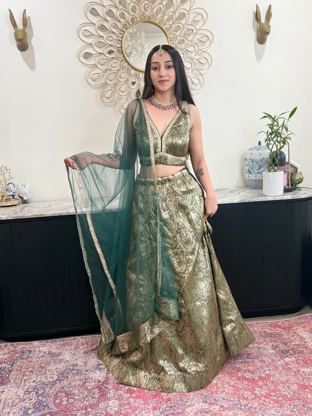 Banarasi lehenga choli with net dupatta front view on model