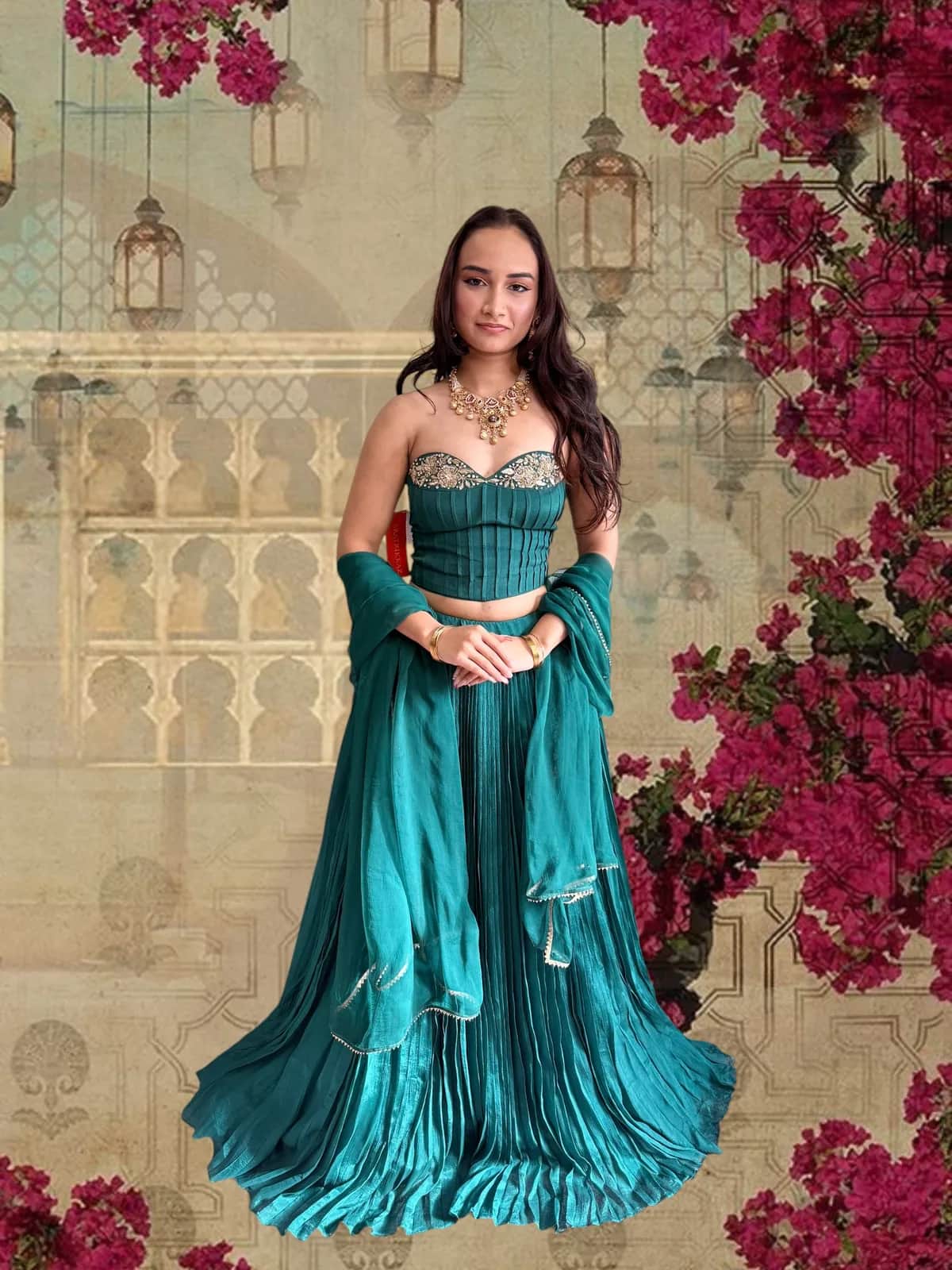 Green Corset Blouse with Custom Lehenga and Dupatta front view on model