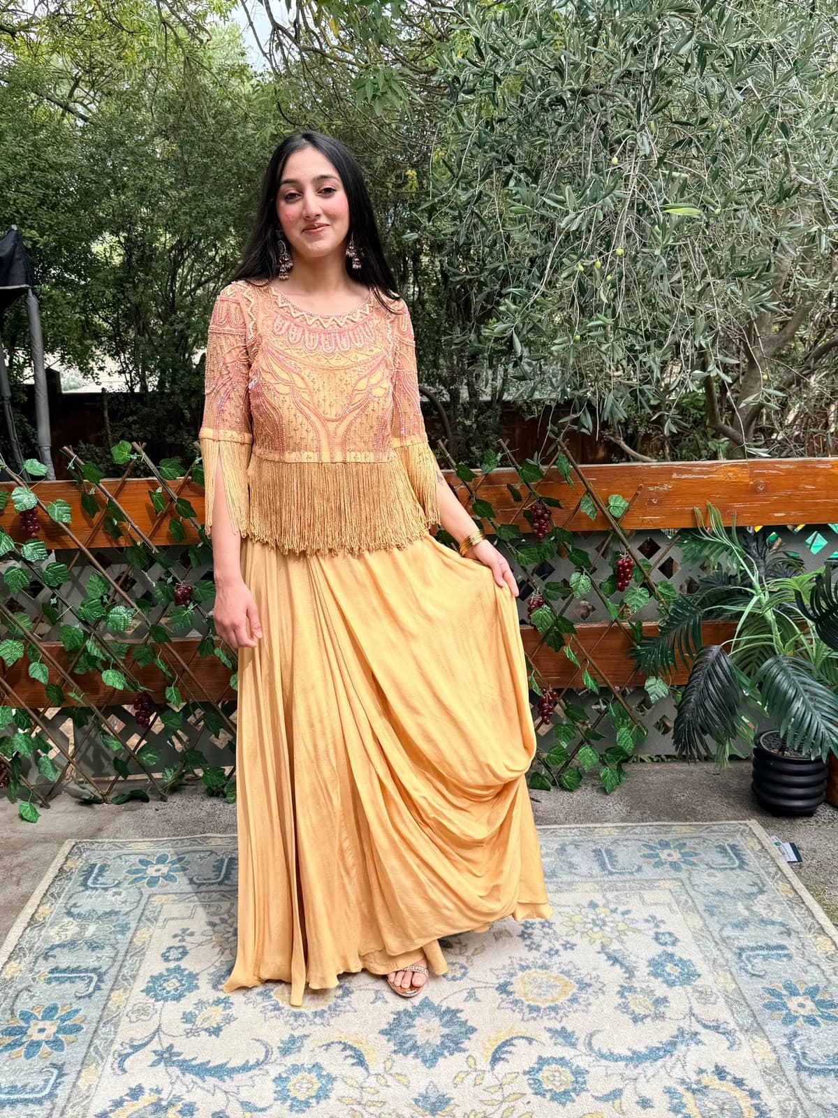 Mustard Dhoti Skirt with Fringe Waistband and Embroidered Crop Top front view on model