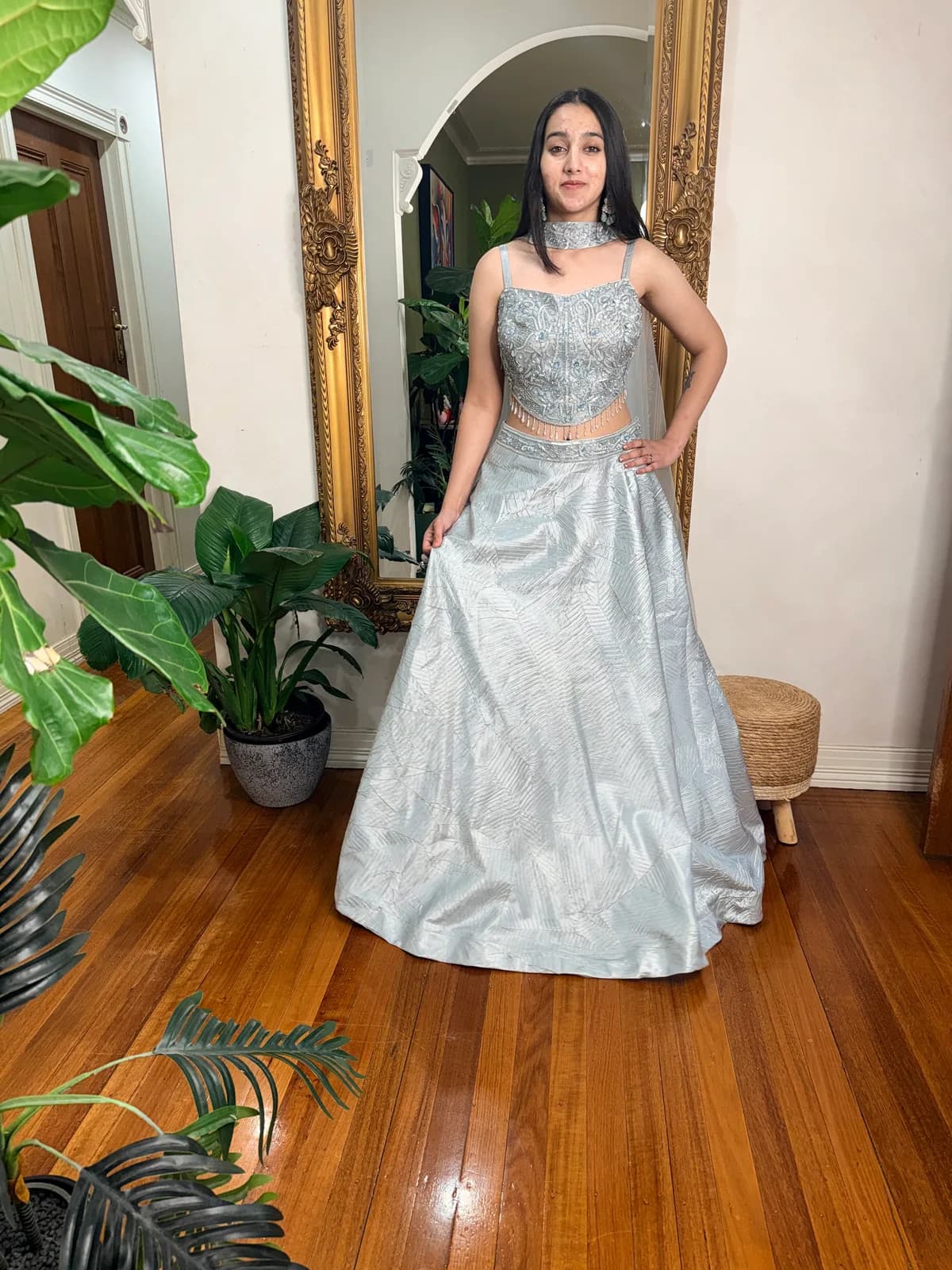 Ice-Blue Hand-Embroidered Corset with Textured Lehenga Skirt front view on model