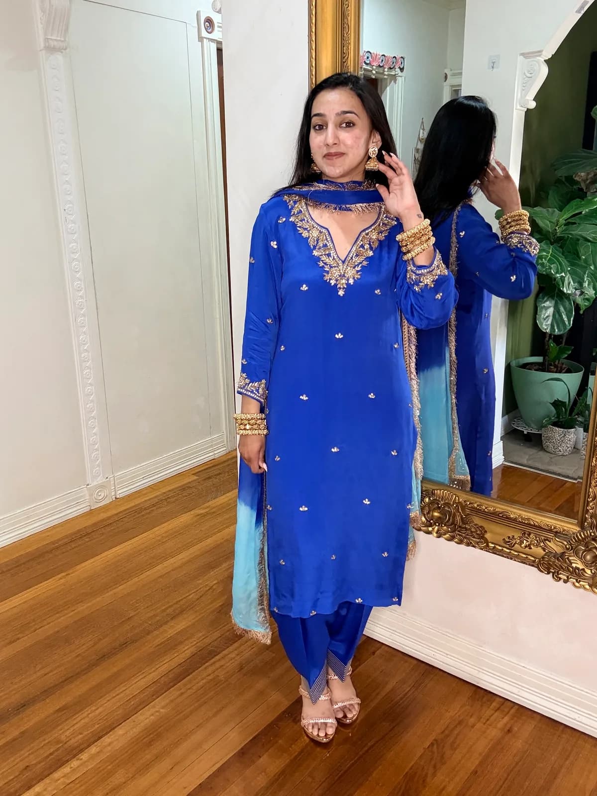 Electric Blue Chinon Salwar Suit with Hand-Embroidered Neckline front view on model