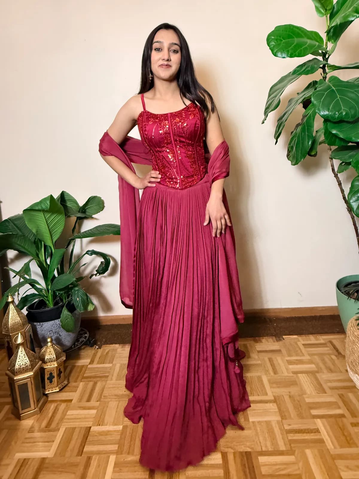 Maroon Pearl and Sequin Corset with Chinon Lehenga Skirt front view on model