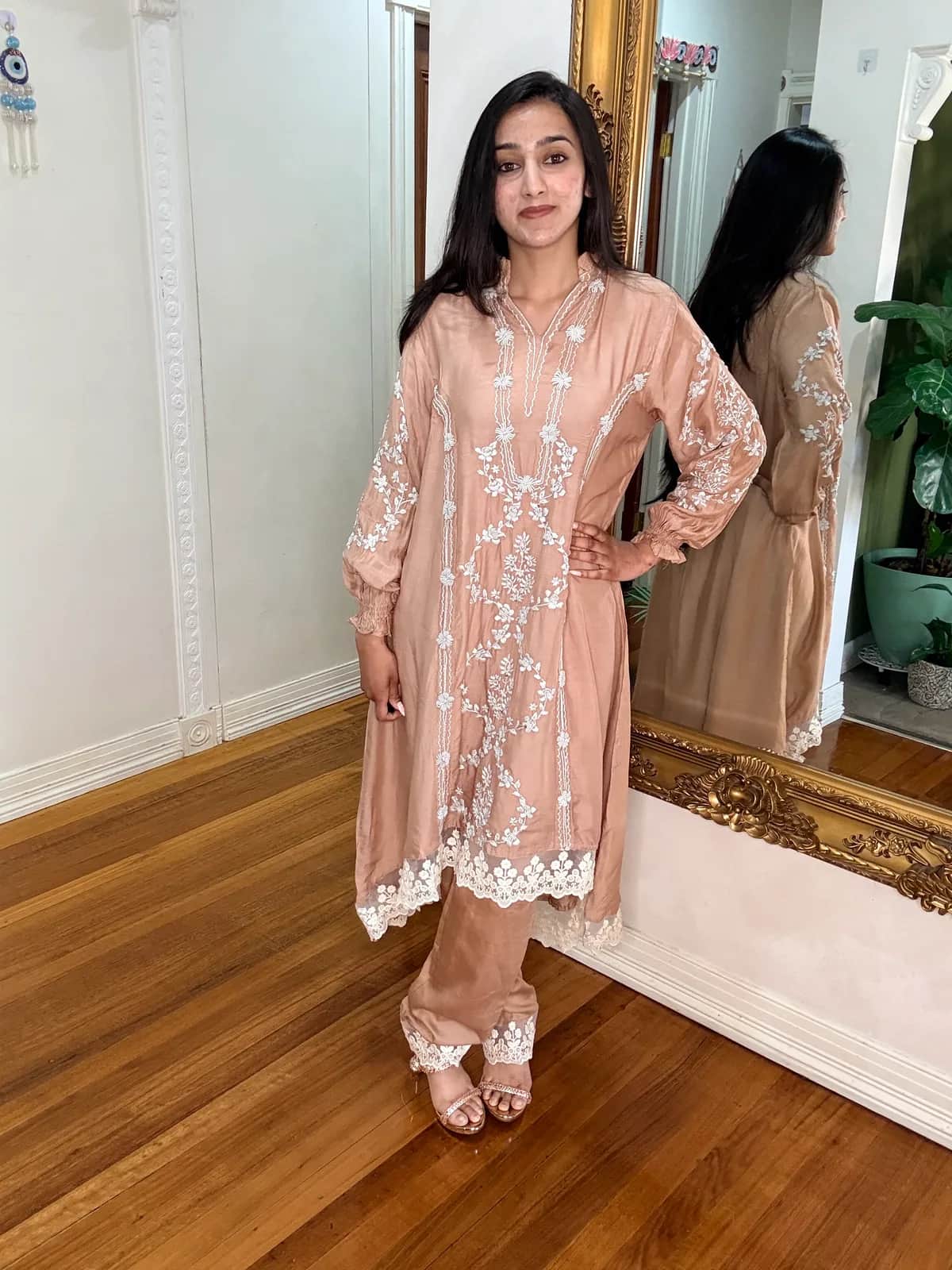 Peach Lucknowi Cotton Silk Kurti with Thread Work front view on model